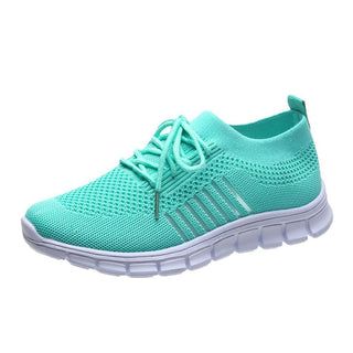 Baskets femme en maille turquoise avec lacets et semelle amortissante blanche