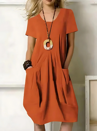 Robe élégante orange à manches courtes, taille froncée et jupe ample