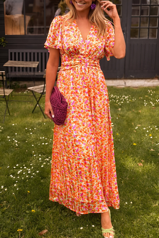 Robe maxi Ava™ orange à motif, décolleté en V, manches courtes bouffantes, taille froncée.