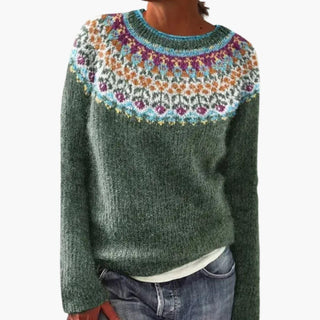 Pull vert à col rond, motif multicolore en bande sur la poitrine.