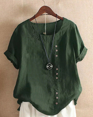 Blouse ample en lin vert foncé, col rond, boutonnage décoratif et manches courtes