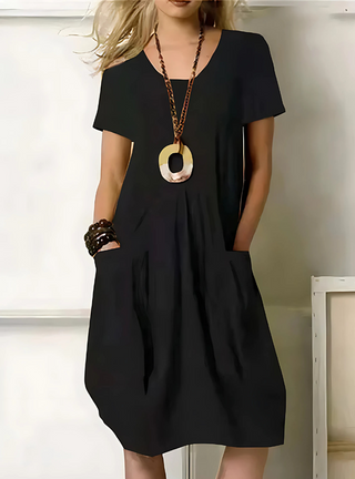 Robe élégante noire à manches courtes, taille froncée et jupe ample