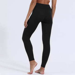Legging thermique doublé en polaire noir, coupe ajustée, doublure polaire visible aux chevilles