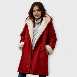 Manteau rouge à col en fourrure synthétique, doublure claire, poches plaquées