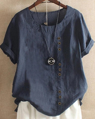 Blouse ample en lin bleu, col rond, boutons décoratifs à l’avant et manches courtes