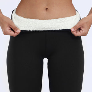 Legging thermique doublé en polaire noir, bordure en tissu polaire clair au niveau de la taille