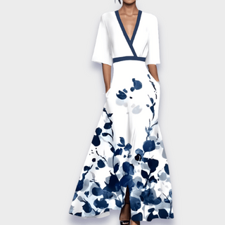 Robe Chloe blanche à fleurs bleu marine, décolleté en V, manches courtes, jupe ample.