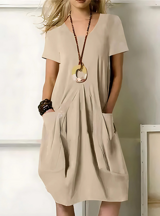 Robe élégante beige à manches courtes, taille froncée et jupe ample