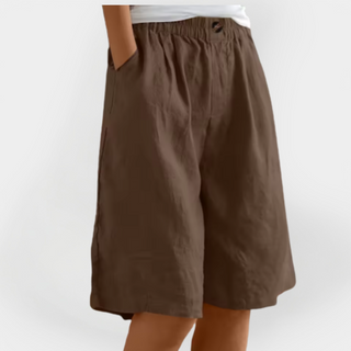 Short en lin marron, taille élastique, poches latérales, bouton sur le devant.