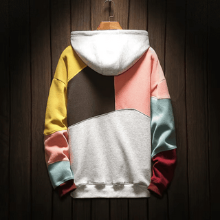 Sweat à capuche oversize patchwork, gris clair, rose, jaune, vert menthe et bordeaux.