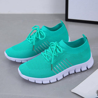 Baskets femme en maille turquoise, lacets, semelle amortissante blanche
