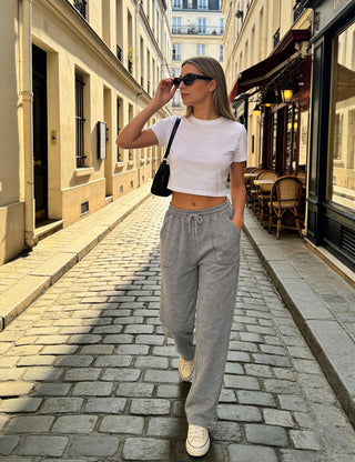 Pantalon de jogging femme gris chiné, taille élastique à cordon, poches plaquées