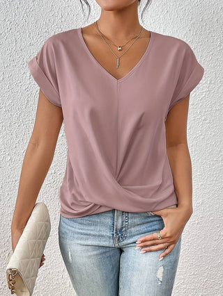 Blouse fluide col V rose à manches courtes, drapée et nouée devant