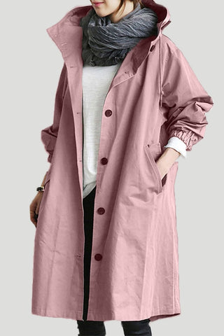 Manteau imperméable long à capuche, rose poudré, boutonnage sombre au centre