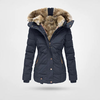 Veste matelassée pour femme bleu foncé, capuche doublée fausse fourrure.