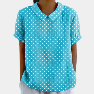 Blouse femme à col Peter Pan, manches courtes, pois blancs sur fond bleu
