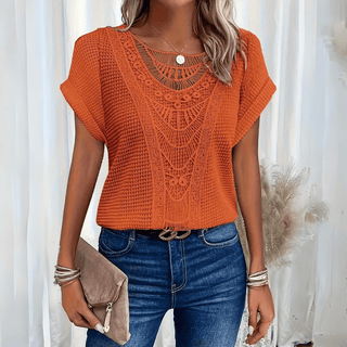 Blouse crochet orange à manches courtes, encolure ronde et motif ajouré au buste