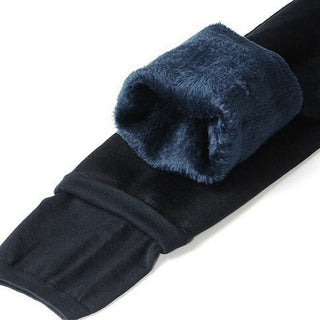Leggings d’hiver bleu foncé femme, doublure polaire au niveau des chevilles, coupe ajustée.