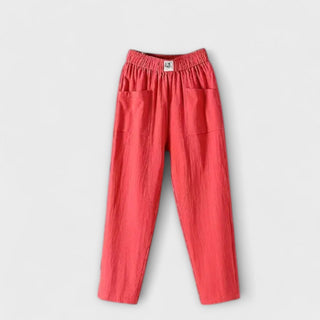 Pantalon en coton et lin rouge, taille élastique, poches plaquées.