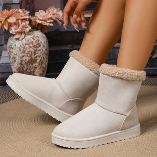 Bottes fourrées mi-mollet blanches en suédine, revers en moumoute, semelle antidérapante