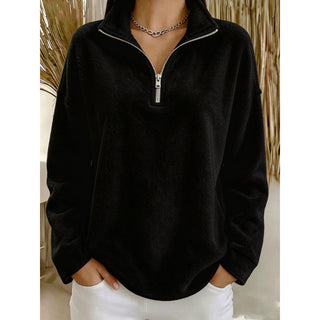 Sweat polaire femme noir, col camionneur et demi-zip, manches longues ample.
