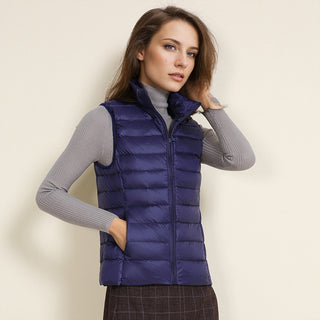 Gilet matelassé bleu foncé à poches et col montant