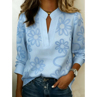 Blouse à col V fendu manches longues bleu clair, motifs floraux bleus