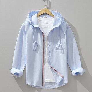 Veste à capuche en lin bleu clair, fermeture zippée, poches, cordons décoratifs.