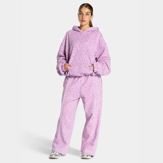 Ensemble sport femme sweat à capuche et pantalon ample imprimé léopard rose clair