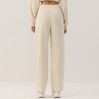 Veste zippée courte crème à col montant, coupe cintrée, manches ballon visibles