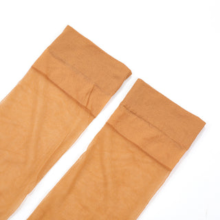 Paire de bas voile fin beige clair, vue détail des coutures.
