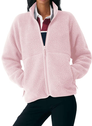 Veste polaire sherpa rose pâle, fermeture zippée, col montant, poches latérales