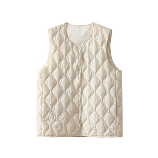 Gilet matelassé sans manches blanc cassé, devant à boutons, motif matelassé en relief.
