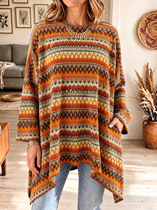 Poncho oversize femme jacquard rayé orange et blanc, encolure ronde, ourlet asymétrique