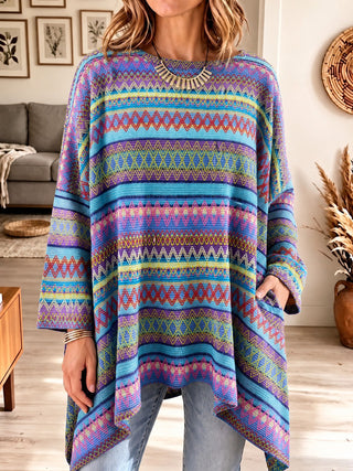 Poncho oversize en jacquard rayé multicolore, manches longues, ourlet asymétrique