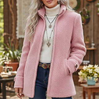 Veste mi-longue en sherpa rose, à col montant, fermeture éclair et poches latérales