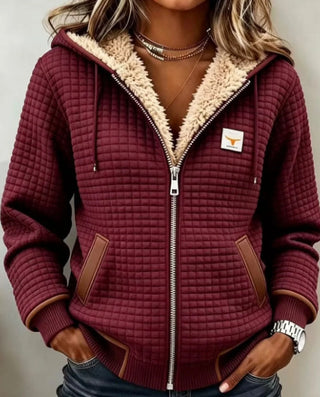 Veste bordeaux à capuche matelassée, doublure en peluche et fermeture zippée