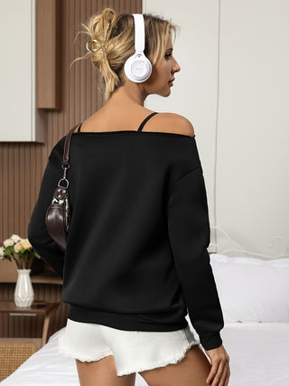 Sweat-shirt noir épaules dénudées avec bretelles fines visibles, manches longues