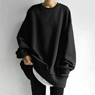 Sweat oversize noir à col rond, manches longues et coupe ample