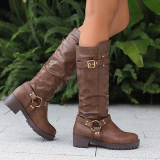 Bottes hautes marron à semelle crantée et brides décoratives