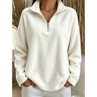 Sweat polaire femme blanc cassé, col camionneur et demi-zip, manches longues.