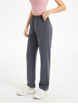 Pantalon de yoga femme gris foncé taille haute, coupe droite fluide, poches et ceinture élastique