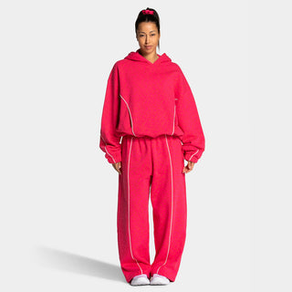 Ensemble sport deux pièces rose : sweat à capuche et pantalon ample confort