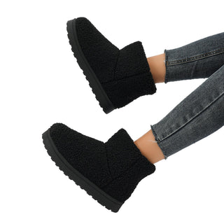 Bottines d’hiver noires fourrées, tige courte à revers et semelle épaisse
