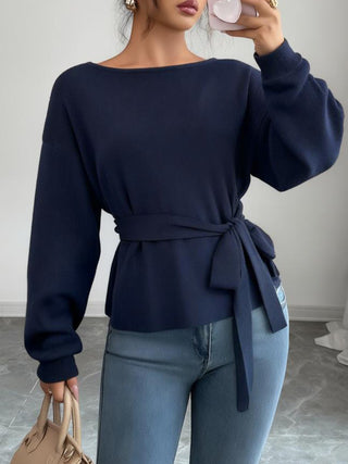 Pull bleu marine en maille à col rond, manches longues, taille ceinturée nouée