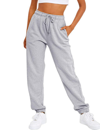 Pantalon de sport gris ample, taille élastique à cordon, bas resserré
