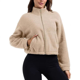 Veste courte en polaire bouclée beige, col montant et fermeture éclair