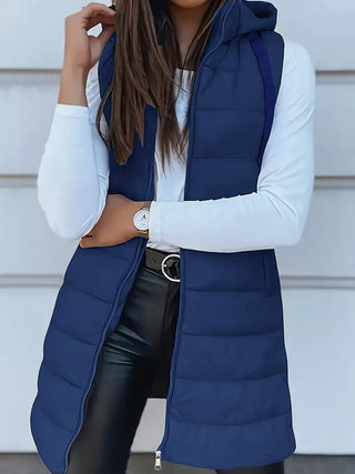 Gilet matelassé sans manches bleu, capuche et zip intégral, coupe longue