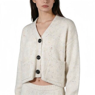 Cardigan femme en maille blanche à col V et boutons noirs, pois multicolores.