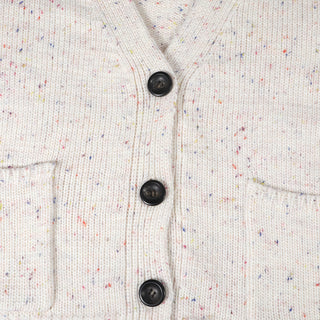 Cardigan femme maille blanche, 3 boutons noirs sur patte boutonnée, pois multicolores.